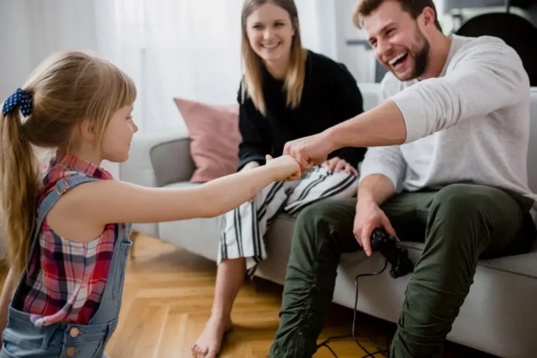 a father spends fun time with his daughter